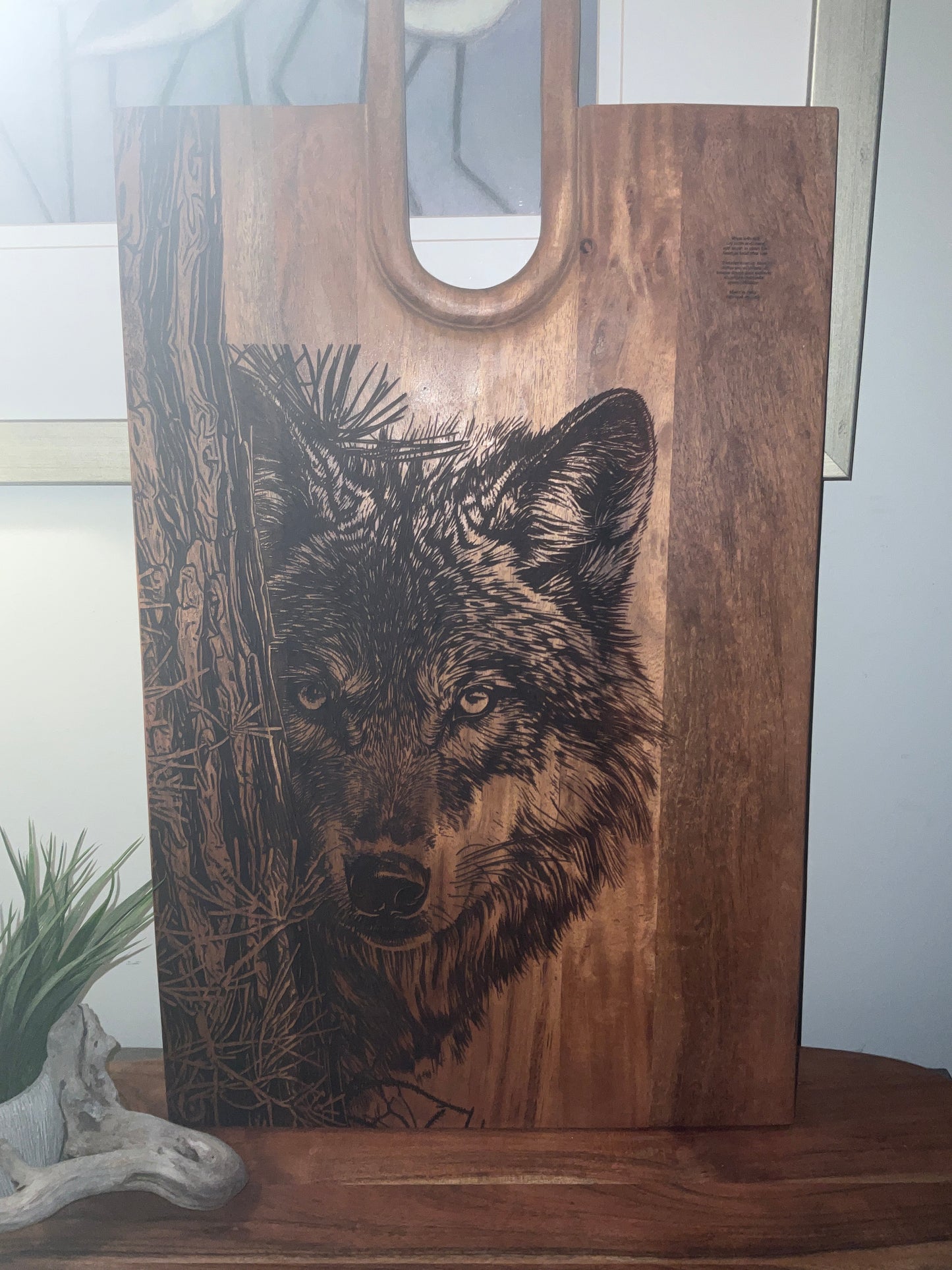Wolf peeking from tree
