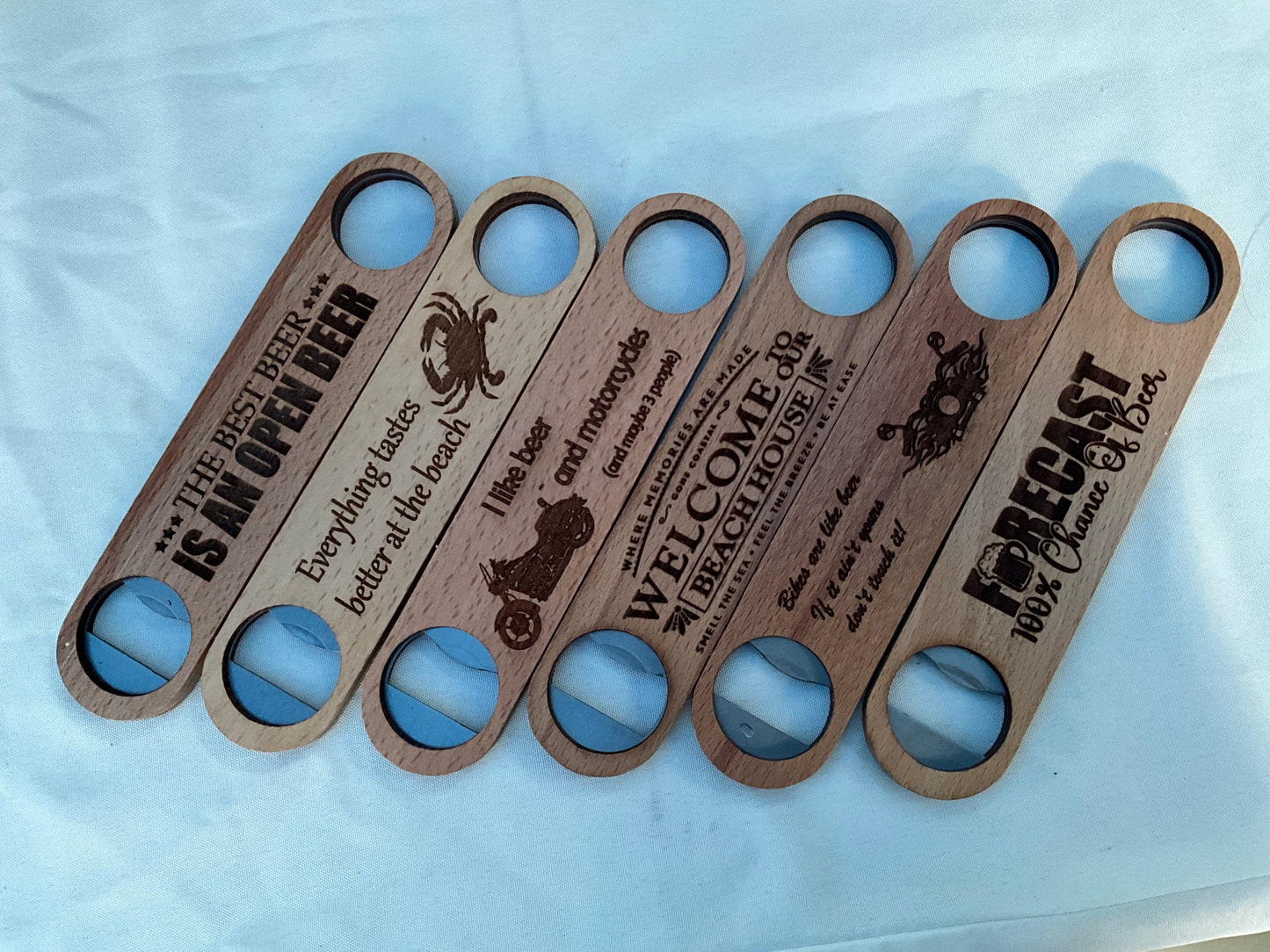 Assorted long wooden bottle openers