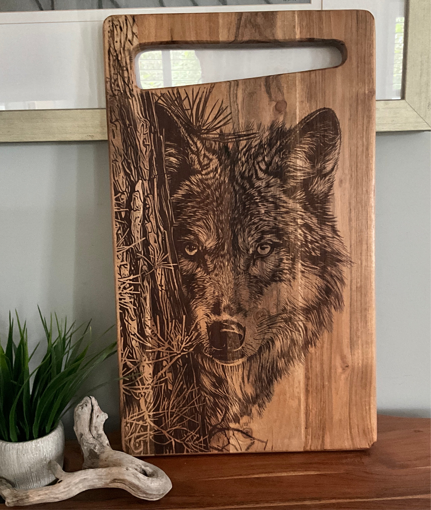 Wolf peeking from tree